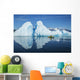 A Sea Kayaker Paddles Beside An Iceberg Wall Mural