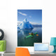 A Sea Kayaker Paddles Beside An Iceberg Wall Mural