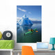 A Sea Kayaker Paddles Beside An Iceberg Wall Mural