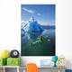 A Sea Kayaker Paddles Beside An Iceberg Wall Mural