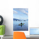 A Sea Kayaker Watches As A Group Of Humpback Whales Lift Their Flukes Wall Mural