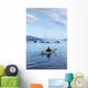 A Sea Kayaker Watches As A Group Of Humpback Whales Lift Their Flukes Wall Mural