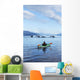 A Sea Kayaker Watches As A Group Of Humpback Whales Lift Their Flukes Wall Mural