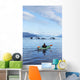A Sea Kayaker Watches As A Group Of Humpback Whales Lift Their Flukes Wall Mural