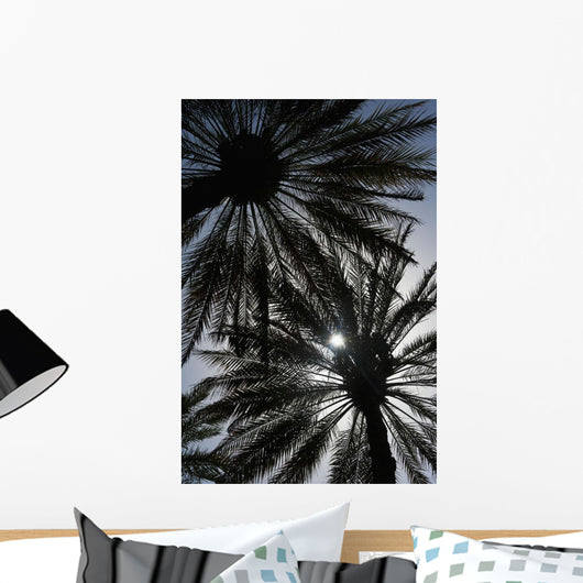 Silhouette Of Date Palm Trees In Oasis Wall Mural