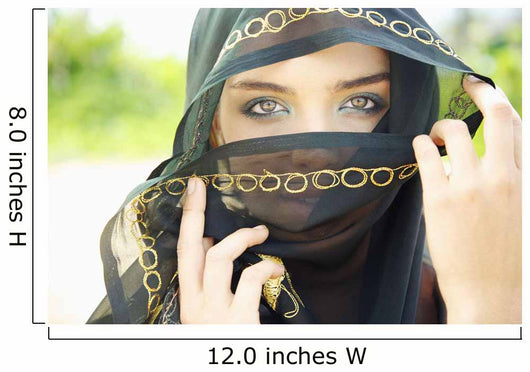 A Woman's Eyes Peering Out From A Headscarf Wall Mural
