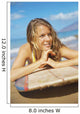 A Young Woman Lays On A Surfboard On The Sand Wall Mural