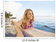 A Young Woman Wearing A Lei Rides A Surfboard Out In The Water Wall Mural