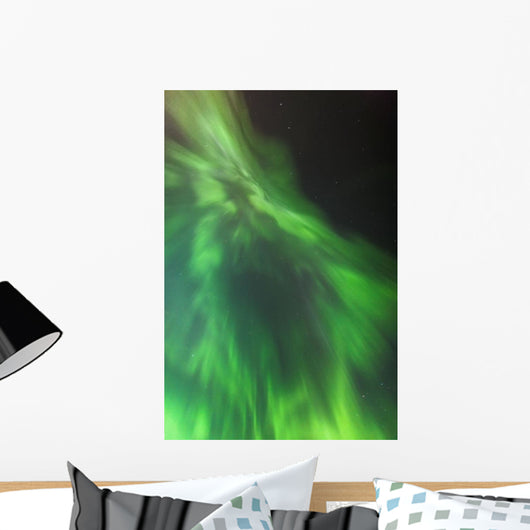 A green northern lights corona Wall Mural