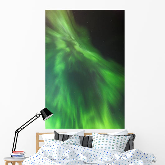 A green northern lights corona Wall Mural