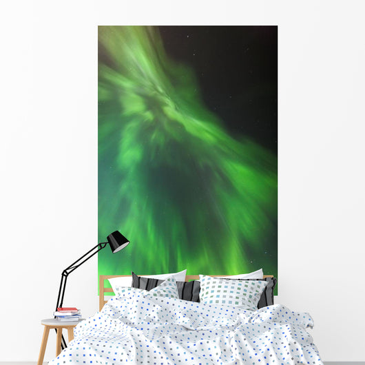 A green northern lights corona Wall Mural