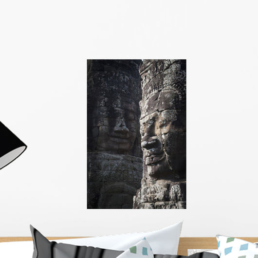 Face sculptures on stone walls at angkor wat;Cambodia Wall Mural