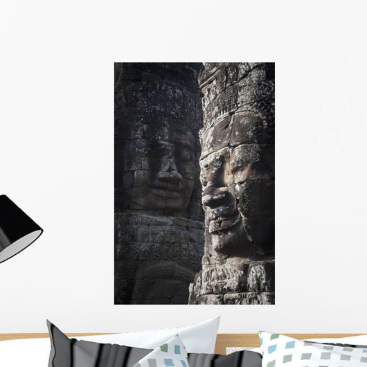 Face sculptures on stone walls at angkor wat;Cambodia Wall Mural