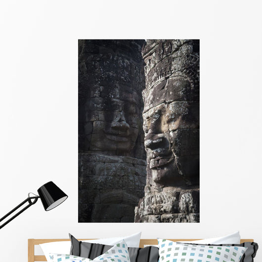 Face sculptures on stone walls at angkor wat;Cambodia Wall Mural