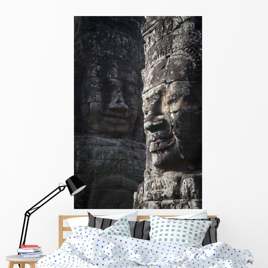 Face sculptures on stone walls at angkor wat;Cambodia Wall Mural