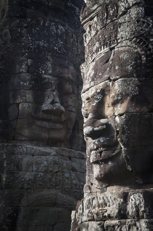 Face sculptures on stone walls at angkor wat;Cambodia Wall Mural