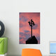 Silhouette of a cross on church steeple with fiery cloud cover Wall Mural