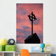 Silhouette of a cross on church steeple with fiery cloud cover Wall Mural