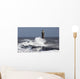 Waves crashing into a lighthouse Wall Mural