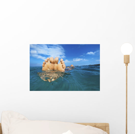 Floating in the ocean Wall Mural
