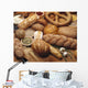Food - Various types of breads and some of their ingredients Wall Mural