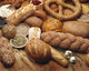 Food - Various types of breads and some of their ingredients Wall Mural