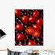 Agriculture - Processing tomatoes on black rocks and red surface Wall Mural