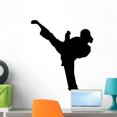 Martial Arts Silhouette Wall Decal shown on a wall