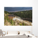 Sunlight Illuminates The Trout River Flows Over Coral Falls Wall Mural