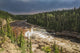 Sunlight Illuminates The Trout River Flows Over Coral Falls Wall Mural