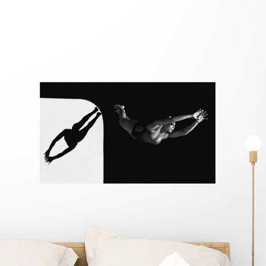 A Woman Diving Into The Unknown Wall Mural