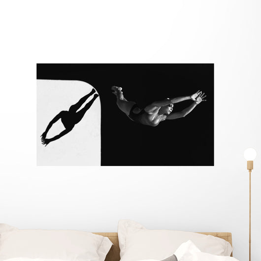 A Woman Diving Into The Unknown Wall Mural