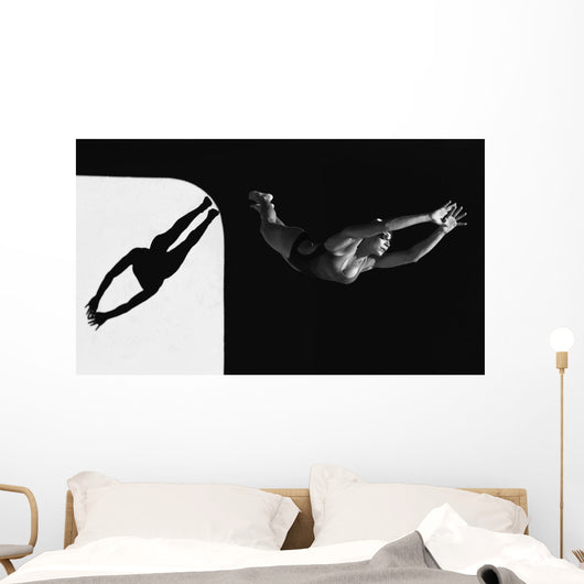 A Woman Diving Into The Unknown Wall Mural