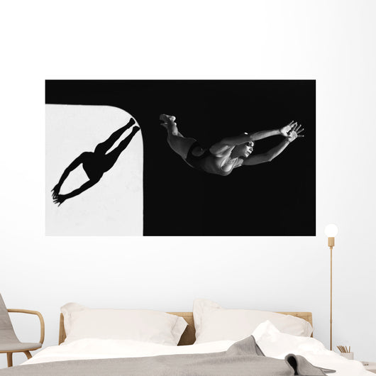 A Woman Diving Into The Unknown Wall Mural