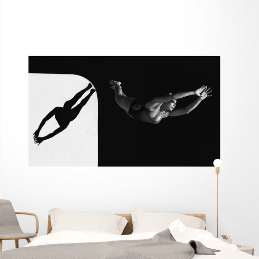 A Woman Diving Into The Unknown Wall Mural