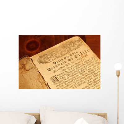 Old German Prayer Book shown on a wall
