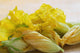 Close Up Of Zucchini Blossoms With Water Drops On Wooden Cutting Board Wall Mural