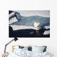 Polar bear on melting sea ice, high angle view from cruise ship Wall Mural