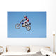 dirt bike jumping in the air Wall Mural