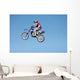 dirt bike jumping in the air Wall Mural
