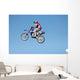 dirt bike jumping in the air Wall Mural