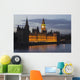 A Building And Clock Tower Along The Water's Edge Illuminated At Dusk Wall Mural