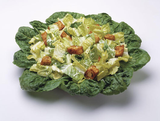 Food - Caesar salad prepared with Romaine lettuce Wall Mural