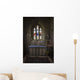 Stained glass windows and a table surrounded with candles in a church Wall Mural