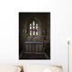 Stained glass windows and a table surrounded with candles in a church Wall Mural