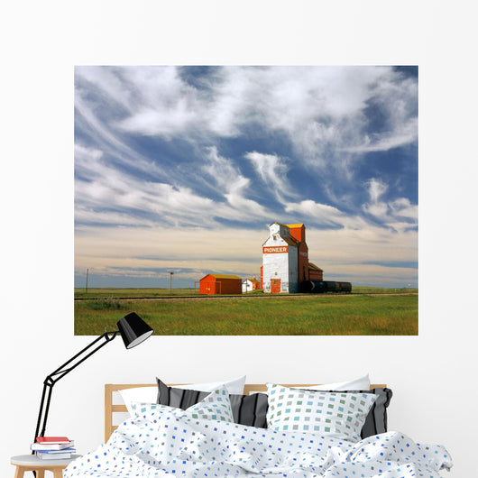 Inland grain terminal with railway in the prairies Wall Mural