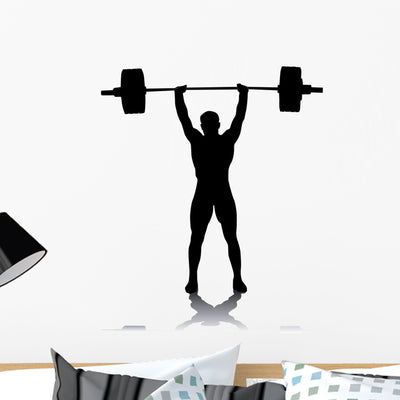 Silhouette Weight-lifter Wall Decal shown on a wall