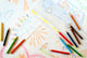 Primitive childish pencil drawing close-up isolated on white. Wall Mural