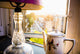 Teapot and lamp on windowsill in afternoon sun, Baron's Court Wall Mural