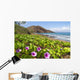 Beach morning glory with Pu'u O'lai in background Wall Mural